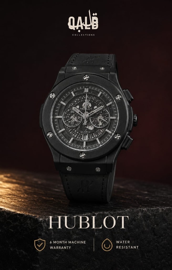 Hublot matte black chronograph on dark stone with a burgundy atelier backdrop